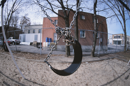 Tangled, metal swing set.