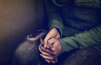 Child with their hands folded