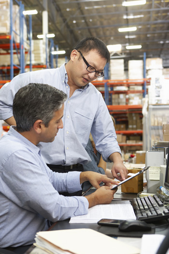 Image of coworkers reviewing data