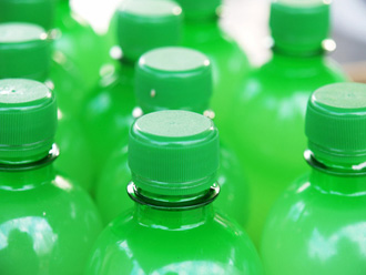 Greenwashing - Green bottles.