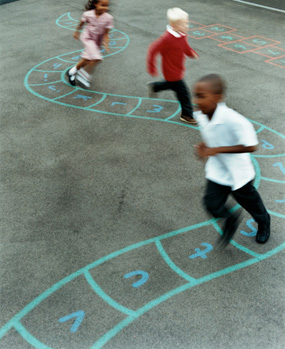 Healthy Communities - children playing in a school yard.