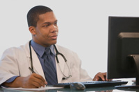 Doctor at a computer