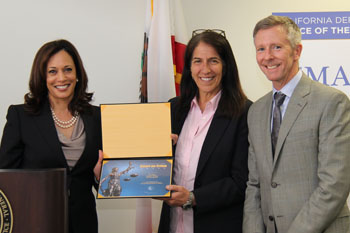AG Kamala Harris presents the Smart on Crime Award to Five Keys Charter School's Sunny Schwartz and Steve Good